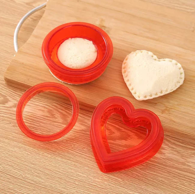 부엌 도구는 제조사 DIY 쿠키 점심 샌드위치 커터와 밀봉기를 굳힙니다