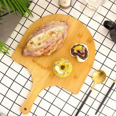 용이미끄럼 모서리와 핸들과 빵집 프리미엄 천연 대나무 원판피자 껍질 이사회